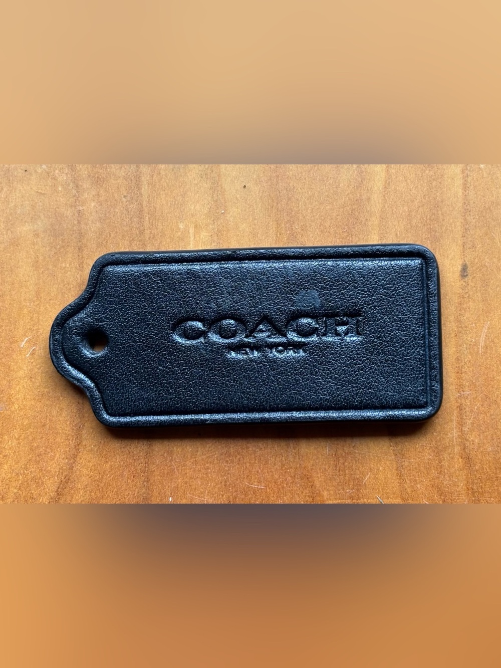 COACH Tag